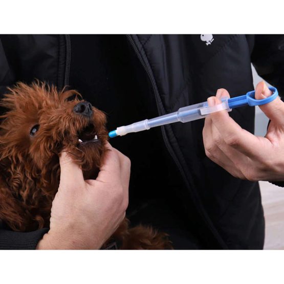 Vexus Pet Medicine Feeder - being used